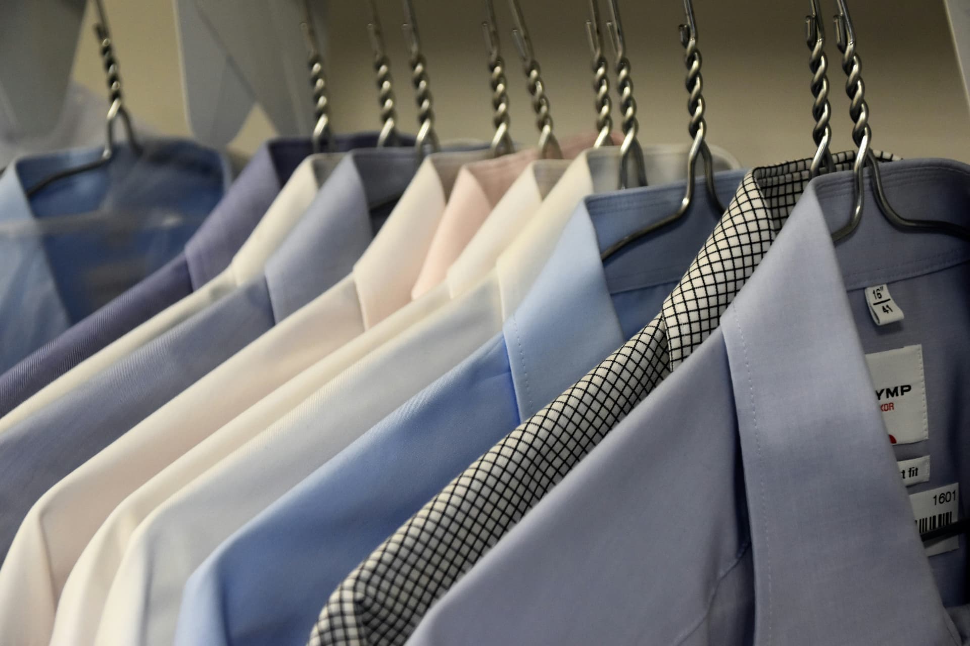 A full rack of clothes from San Jose dry cleaning store, Cleaners Connections.